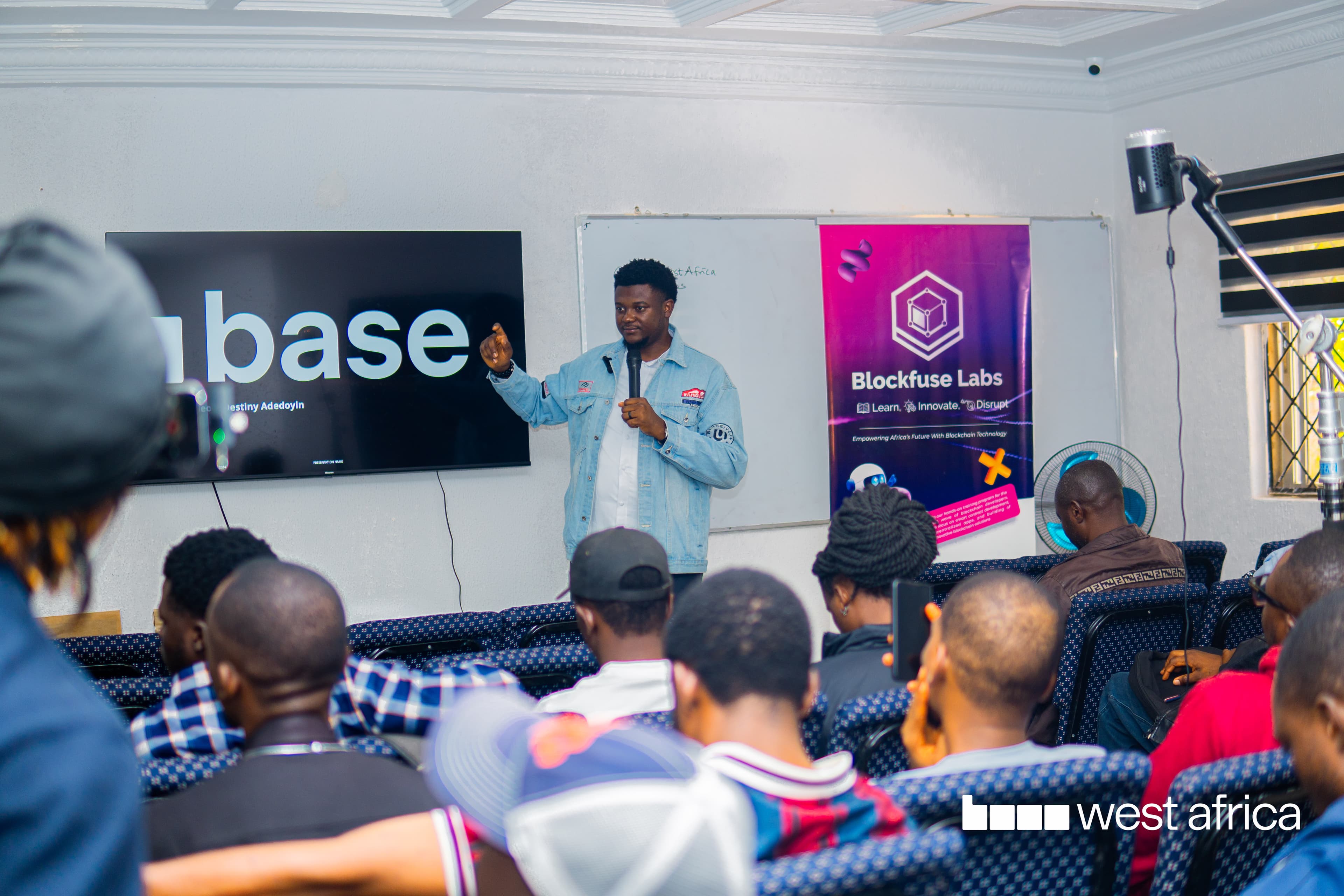 A Blockfuse Labs speaker presenting a blockchain session to a full room